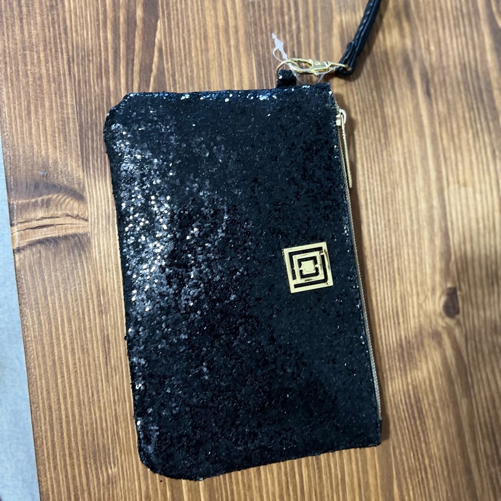 Liz Claiborne wristlet with portable charging station